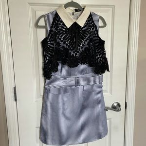 Blue and white collared dress with black lace